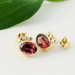 earrings in yellow gold 18K with round diamonds and oval tourmaline