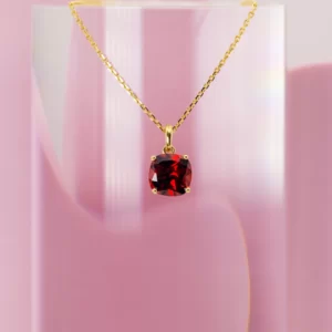 necklace in yellow gold 18K with a rhodolite central stone