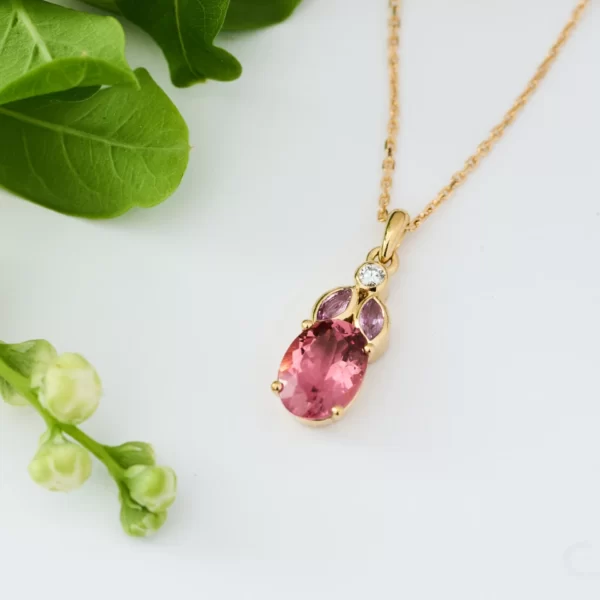 necklace in yellow gold 18K with marquise stones in pink saphir, diamonds and oval tourmaline